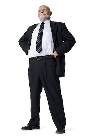 simsearch:640-01366339,k - Businessman standing with arms akimbo Foto de stock - Royalty Free Premium, Número: 640-01351902