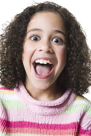 shocked tween girls - Portrait of a girl smiling Stock Photo - Premium Royalty-Free, Code: 640-01351951