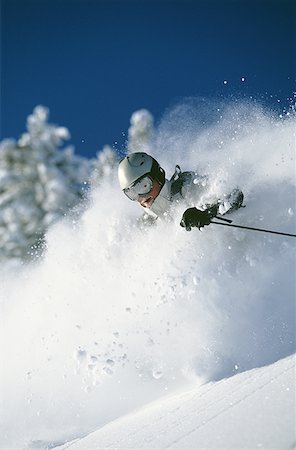 simsearch:640-01362181,k - Downhill skier skiing on mountain Foto de stock - Sin royalties Premium, Código: 640-01352159