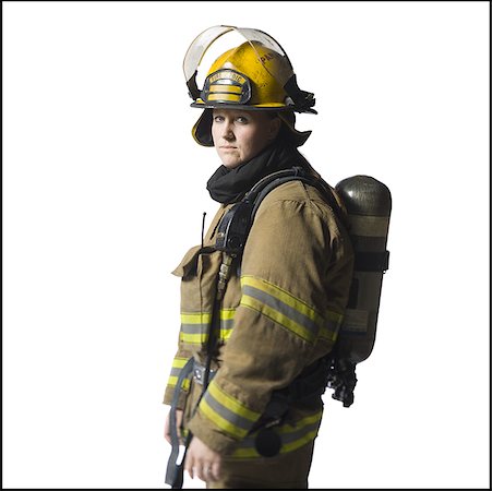 female firefighter portrait - Portrait of a female firefighter Foto de stock - Sin royalties Premium, Código: 640-01352210