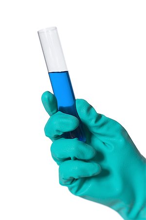 Person holding a test tube Stock Photo - Premium Royalty-Free, Code: 640-01352275