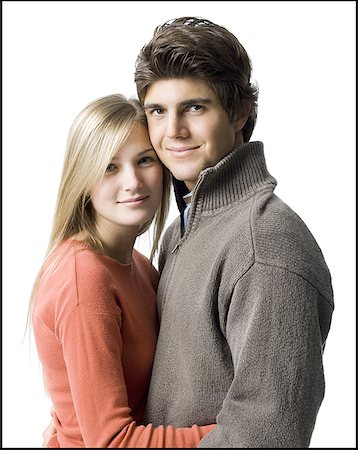 simsearch:640-03257281,k - Portrait of a young couple embracing each other Foto de stock - Sin royalties Premium, Código: 640-01352330