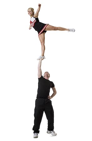 silhouette two people balancing - Équipe de cheerleading Photographie de stock - Premium Libres de Droits, Code: 640-01352404