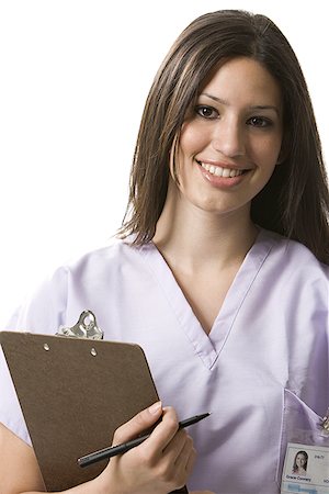 Portrait of a nurse holding a clipboard Stock Photo - Premium Royalty-Free, Code: 640-01352405