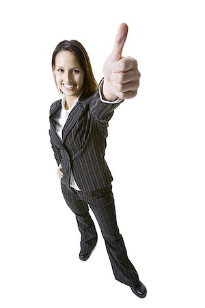 shoe overhead on white - Portrait of a businesswoman showing a thumbs up sign Stock Photo - Premium Royalty-Free, Code: 640-01352490