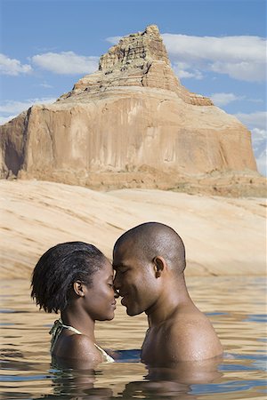 simsearch:640-01350948,k - Profile of a young couple standing in a lake Stock Photo - Premium Royalty-Free, Code: 640-01352593