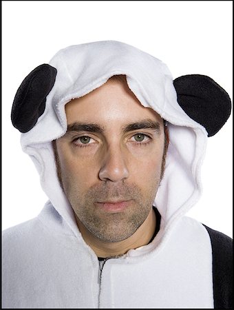 Portrait d'un homme adult milieu vêtu d'un costume d'ours Photographie de stock - Premium Libres de Droits, Code: 640-01352636
