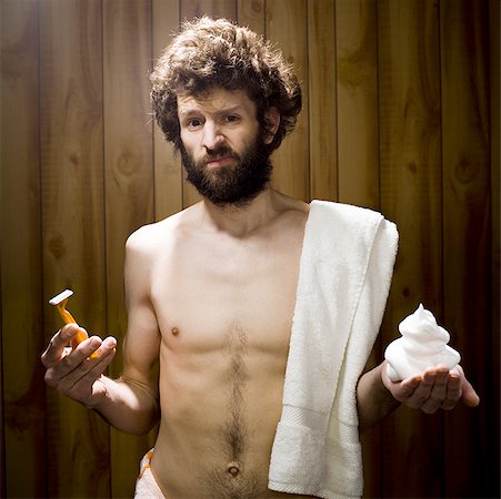 face cream male - Man in towel with razor and shaving cream Stock Photo - Premium Royalty-Free, Code: 640-01352774