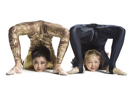 Female contortionist duo performing Foto de stock - Sin royalties Premium, Código: 640-01352797
