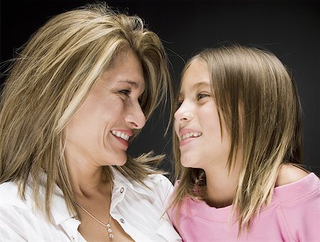 Close-up of a mother with her daughter Stock Photo - Premium Royalty-Free, Code: 640-01353100
