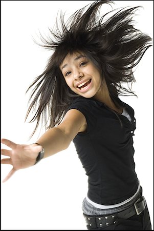 simsearch:400-04889881,k - Portrait of a young woman in motion Stock Photo - Premium Royalty-Free, Code: 640-01353146