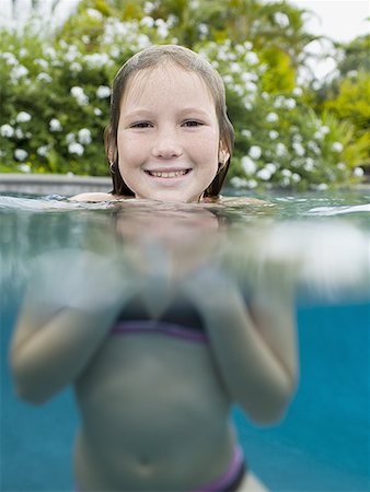 simsearch:640-02764438,k - Portrait of a girl neck deep in water Stock Photo - Premium Royalty-Free, Code: 640-01353159