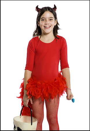Portrait d'une jeune fille portant des cornes de diable Photographie de stock - Premium Libres de Droits, Code: 640-01353166