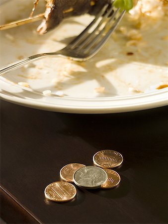 Close-up of a restaurant table with a small tip Stock Photo - Premium Royalty-Free, Code: 640-01353393