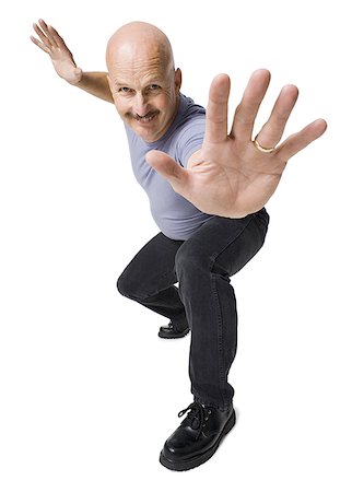 simsearch:640-01348313,k - Portrait of a mature man giving stop gesture Stock Photo - Premium Royalty-Free, Code: 640-01353406