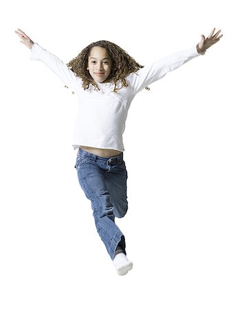 fun kid 10 - Portrait of a girl with her arms outstretched Stock Photo - Premium Royalty-Free, Code: 640-01353673