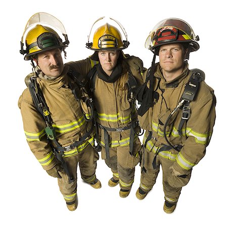firefighter and white background and full body - Portrait of three firefighters Stock Photo - Premium Royalty-Free, Code: 640-01353687