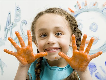 simsearch:640-01358480,k - Portrait of a girl showing her painted hands Foto de stock - Sin royalties Premium, Código: 640-01353814