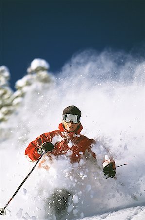 simsearch:640-01362181,k - Downhill skier skiing on mountain Foto de stock - Sin royalties Premium, Código: 640-01353857