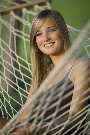 simsearch:640-01351711,k - Portrait of a teenage girl sitting on a hammock Stock Photo - Premium Royalty-Free, Code: 640-01353945