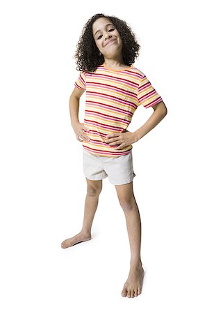 fun kid 10 - Full length portrait of a girl smiling Stock Photo - Premium Royalty-Free, Code: 640-01353982