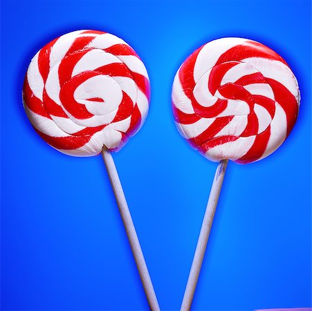 Close-up of two lollipops Stock Photo - Premium Royalty-Free, Code: 640-01364222