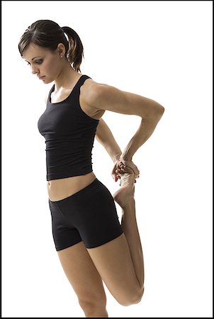 simsearch:640-02767035,k - Profile of a woman stretching her legs Stock Photo - Premium Royalty-Free, Code: 640-01364370