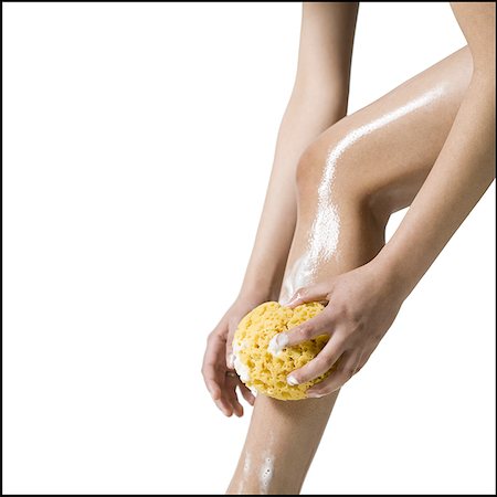 sponge bath woman - woman washing legs Stock Photo - Premium Royalty-Free, Code: 640-01364457