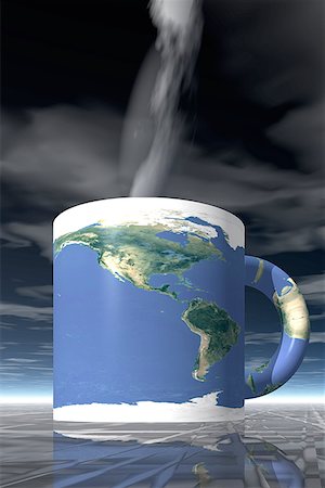 Vue de l'angle faible d'une tasse de café avec la carte du monde à ce sujet Photographie de stock - Premium Libres de Droits, Code: 640-01364555