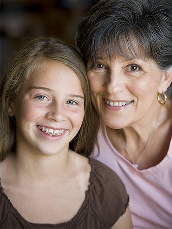 dental mother - Grandmother and daughter smiling with braces Stock Photo - Premium Royalty-Free, Code: 640-01364572