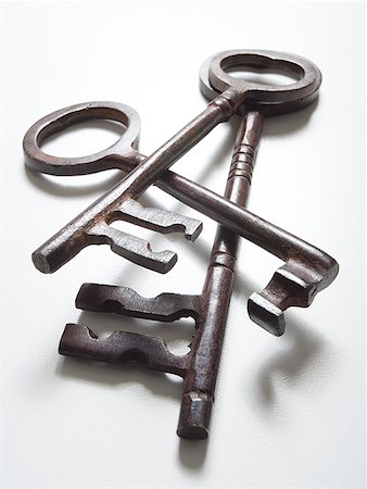 Detailed view of three skeleton keys Stock Photo - Premium Royalty-Free, Code: 640-01364635