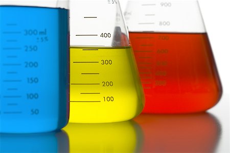 Close-up of beakers with colored liquid Stock Photo - Premium Royalty-Free, Code: 640-01364786