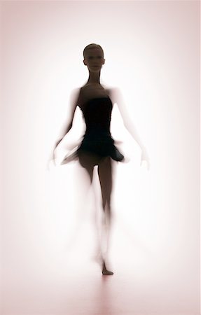 Silhouette of a female ballerina standing Stock Photo - Premium Royalty-Free, Code: 640-01364924