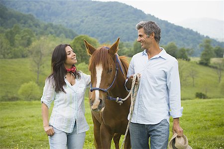 man and a woman with a horse Foto de stock - Sin royalties Premium, Código: 640-01365041