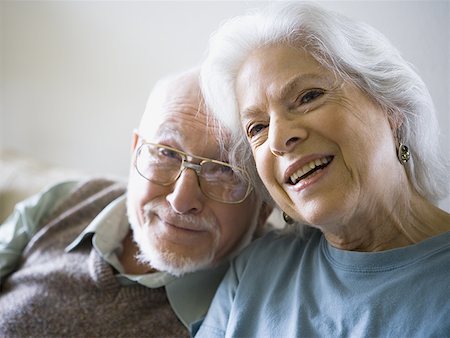 felicidades - Close-up of a senior couple smiling Stock Photo - Premium Royalty-Free, Code: 640-01365106