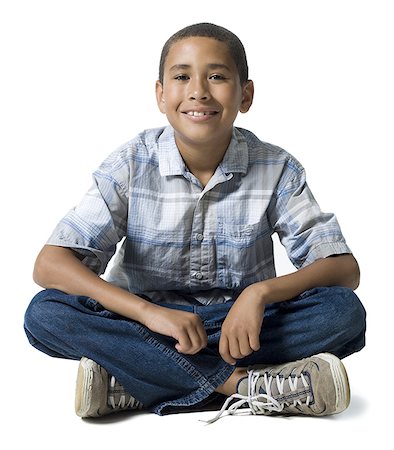 simsearch:640-01362252,k - Portrait of a boy smiling Foto de stock - Royalty Free Premium, Número: 640-01365244