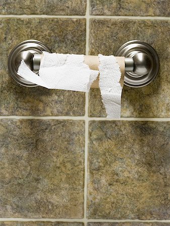 Empty toilet paper roll Fotografie stock - Premium Royalty-Free, Codice: 640-01365241