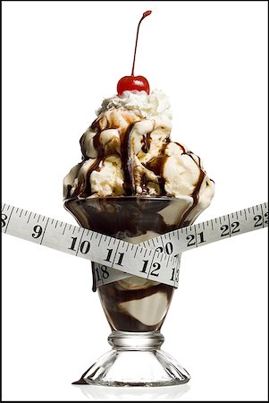 simsearch:640-01355019,k - Close-up of a tape measure around an ice-cream Stock Photo - Premium Royalty-Free, Code: 640-01365290