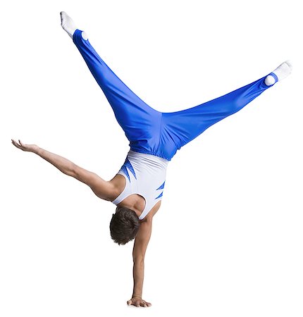 simsearch:640-01351488,k - Male gymnast doing floor exercises Foto de stock - Sin royalties Premium, Código: 640-01365429