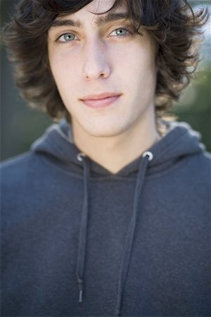 Portrait of a teenage boy thinking Stock Photo - Premium Royalty-Free, Code: 640-01365454