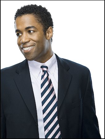 simsearch:640-01362252,k - Close-up of a businessman smiling Foto de stock - Royalty Free Premium, Número: 640-01365539