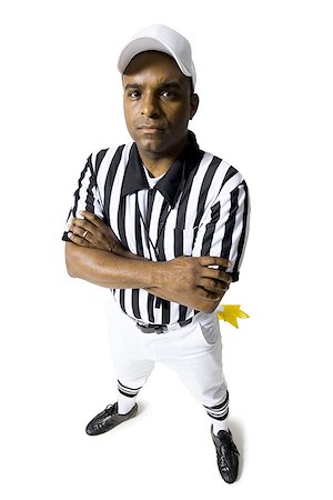 Referee standing with arms crossed Foto de stock - Sin royalties Premium, Código: 640-01365579