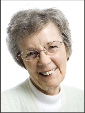 Portrait of a senior woman smiling Stock Photo - Premium Royalty-Free, Code: 640-01365620
