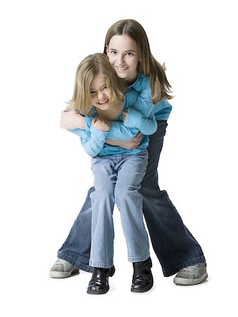 Portrait of two girls smiling Foto de stock - Sin royalties Premium, Código: 640-01365655