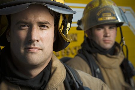 simsearch:640-01358080,k - Portrait of two firefighters wearing helmets Stock Photo - Premium Royalty-Free, Code: 640-01365746