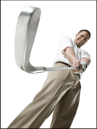 simsearch:640-01362317,k - Low angle view of a man holding a golf club Foto de stock - Sin royalties Premium, Código: 640-01365822