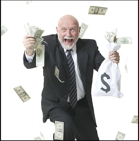 simsearch:640-01351902,k - Portrait of a businessman holding dollar bills Foto de stock - Sin royalties Premium, Código: 640-01365948