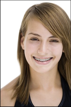 Smiling girl with braces Stock Photo - Premium Royalty-Free, Code: 640-01365998