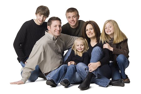 family mom dad studio shot white background full length - Portrait of a family sitting together Stock Photo - Premium Royalty-Free, Code: 640-01366021