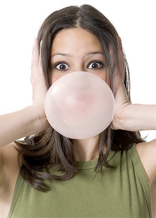exploser (éclater) - Portrait d'une jeune femme soufflant de bubble-gum Photographie de stock - Premium Libres de Droits, Code: 640-01366085